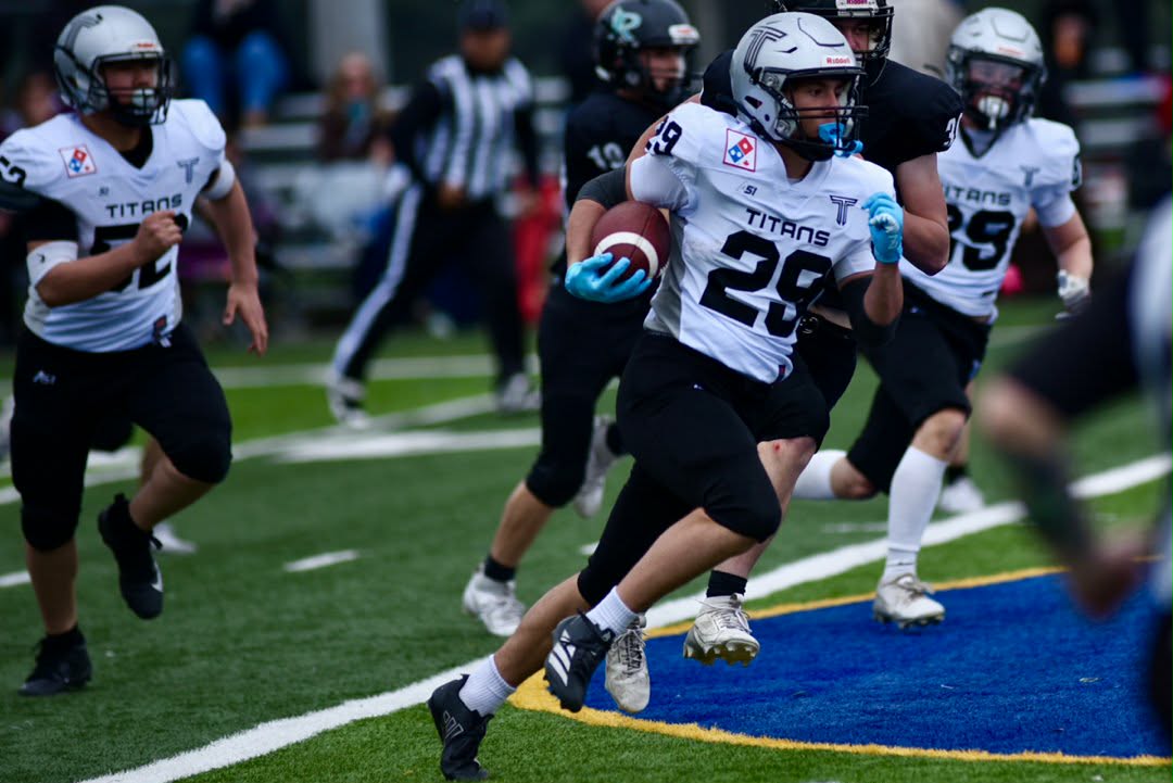 Jack Katsilieris, number 29, running with the football