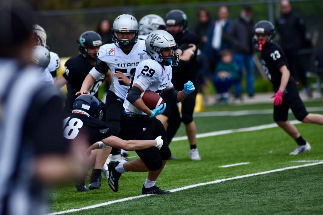 Jack Katsilieris securing the football through contact
